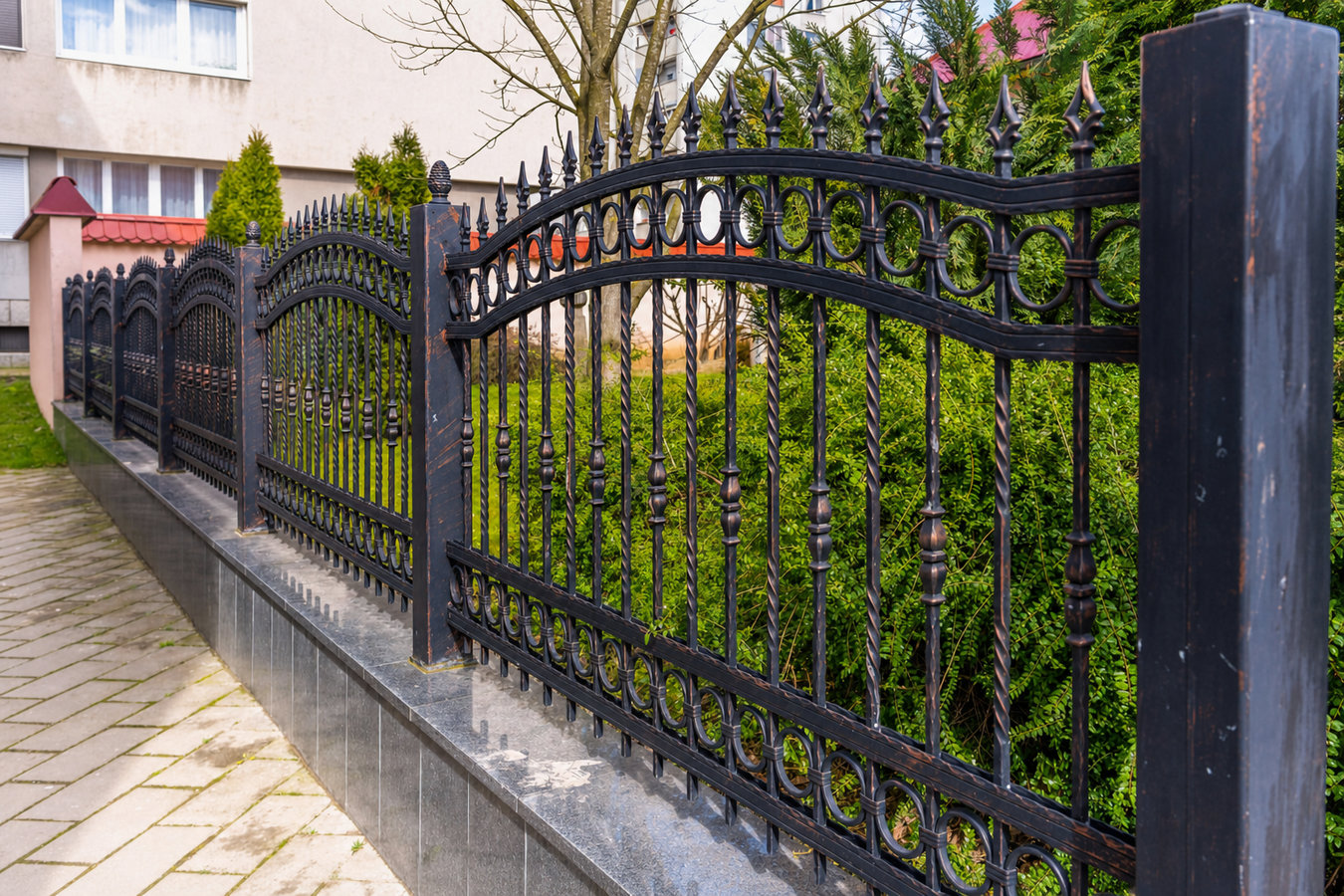 Ornamental iron fence installation